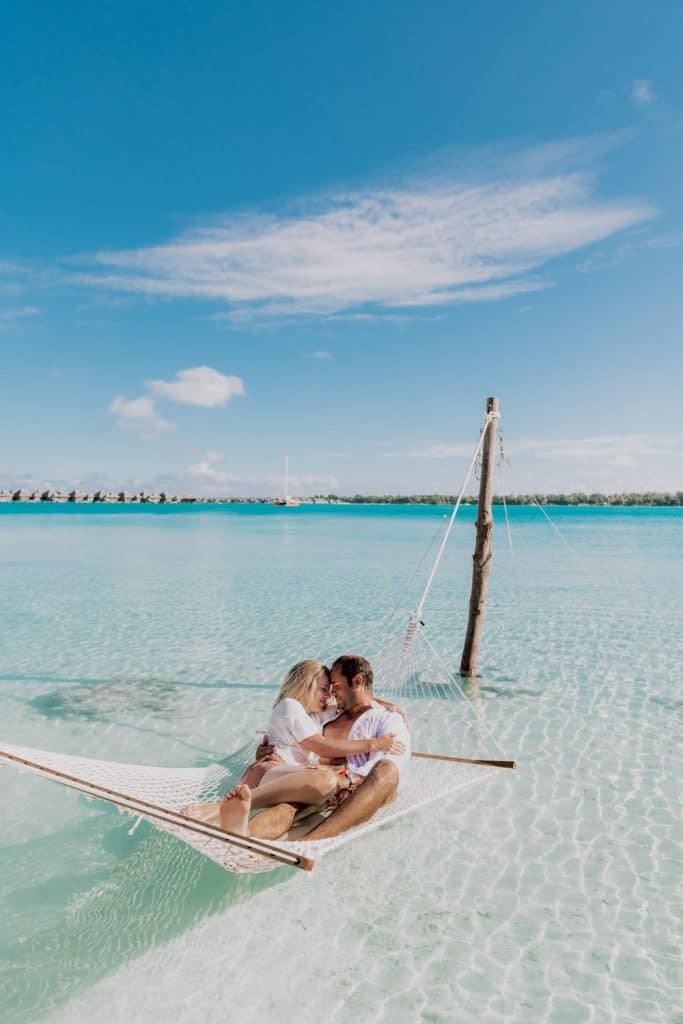 photoshoot at the St Régis Bora Bora water hammock
