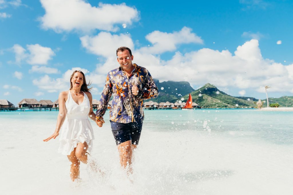 couple photoshoot at the Four Seasons Bora Bora main beach